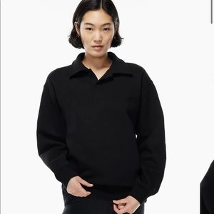 Aritizia’s Tna Cozy Fleece Boyfriend Polo Sweatshirt in Black